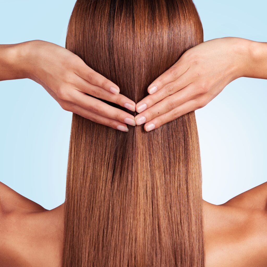 Woman with healthy, glossy hair at Koukla Hair Studio, Niddrie